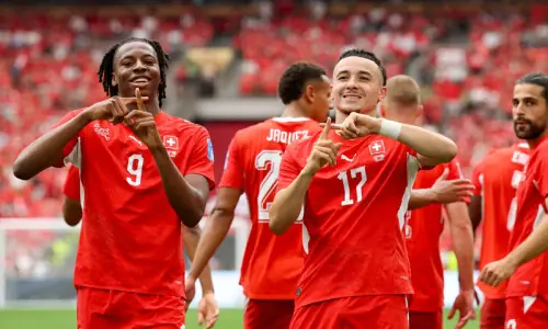 Switzerland down Canada to top Group B