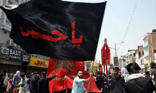 In pictures: Mourners in black take part in Muharram 9 processions across Pakistan