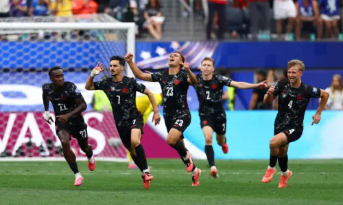 Canada reach World Cup last 16 as late strike sinks South Africa