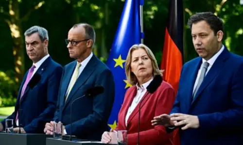 Under-fire German ruling coalition unveils reform package to boost economy Under-fire German ruling coalition unveils reform package to boost economy