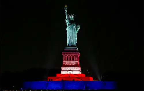 Statue of Liberty dazzles with lasers, music for US anniversary Statue of Liberty dazzles with lasers, music for US anniversary