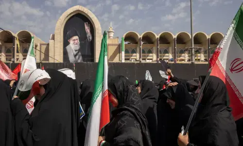 Grief, defiance on display as Tehran warns foes again