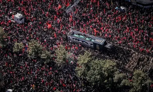 Millions gather as funeral procession of Iran's assassinated supreme leader begins in Tehran