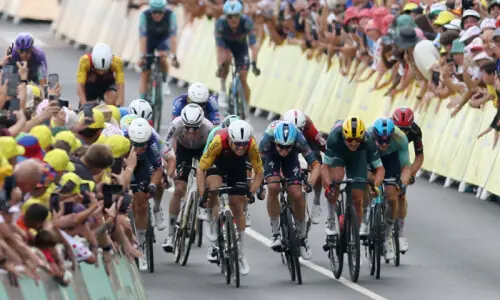 Merlier claims hat-trick of Tour de France stage wins