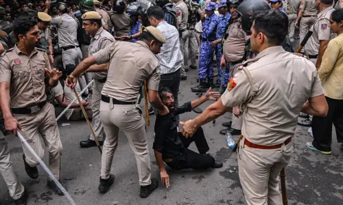 Indian police fire tear gas, baton-charge Cockroach Janta Party protesters trying to march on parliament in Delhi Indian police fire tear gas, baton-charge Cockroach Janta Party protesters trying to march on parliament in Delhi