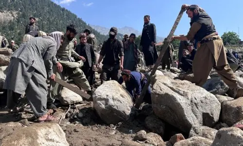 Afghans search for dozens missing, some with bare hands, after devastating flood in Nuristan province Afghans search for dozens missing, some with bare hands, after devastating flood in Nuristan province