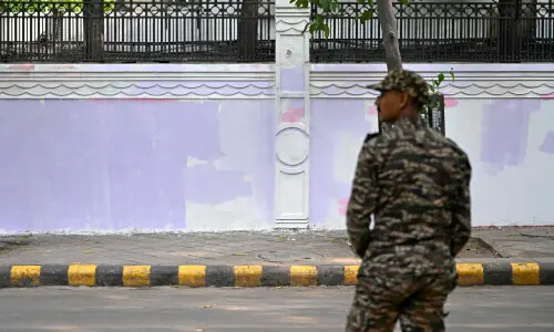 Modi announces panel to reform exam system; anti-govt graffiti at protest site painted over