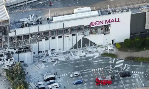 Southern Japan rocked by major earthquake, people trapped in mall