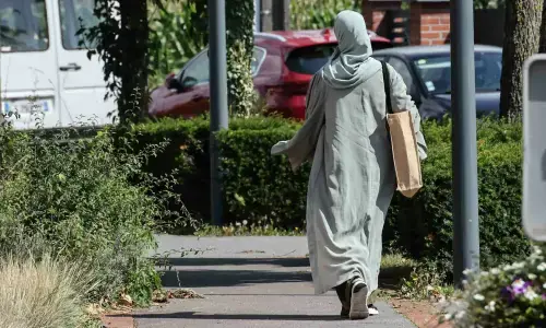 Senate panel restricts Islamic banks from compelling female employees to wear abayas Senate panel restricts Islamic banks from compelling female employees to wear abayas