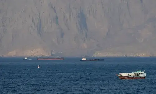 Cargo vessel hit by 'unknown projectile' in Hormuz strait: maritime agency
