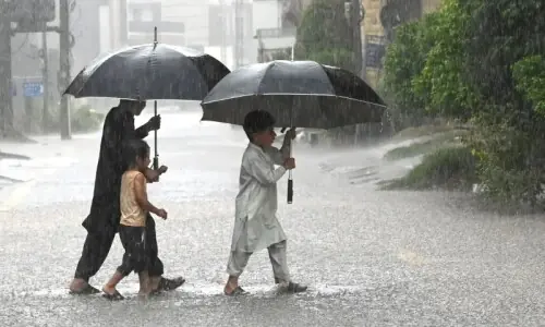 Heavy rain swamps low-lying areas in twin cities, brings mercury down Heavy rain swamps low-lying areas in twin cities, brings mercury down