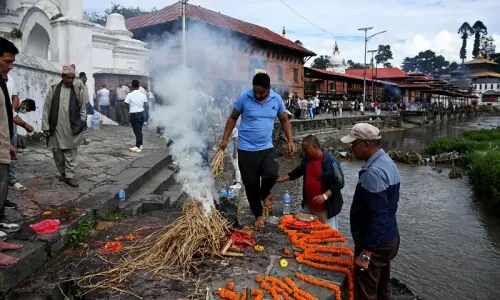 'We had to do this to set his soul free': Families hold symbolic funerals in Nepal for missing flood victims 'We had to do this to set his soul free': Families hold symbolic funerals in Nepal for missing flood victims