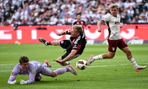 Minnows Augsburg sink Frankfurt to top Bundesliga table Minnows Augsburg sink Frankfurt to top Bundesliga table