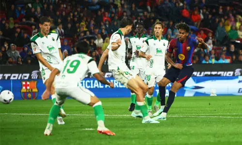 Barcelona hit seven in Racing Santander rout