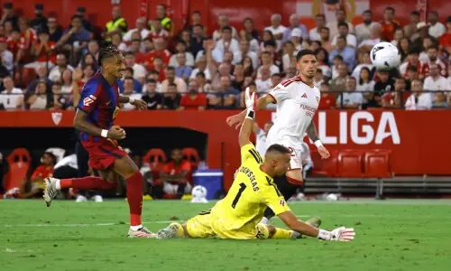 Raphinha treble fires perfect Barcelona to win at Sevilla