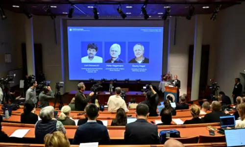 German and US scientists win Nobel medicine prize for work on optogenetics