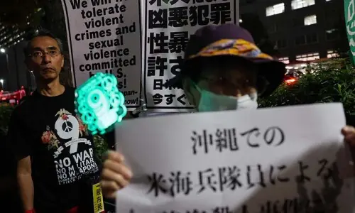 Dozens protest in Tokyo after US Marine accused of woman's murder in Okinawa