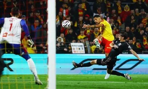 Lyon blow chance to go top after loss at Lens