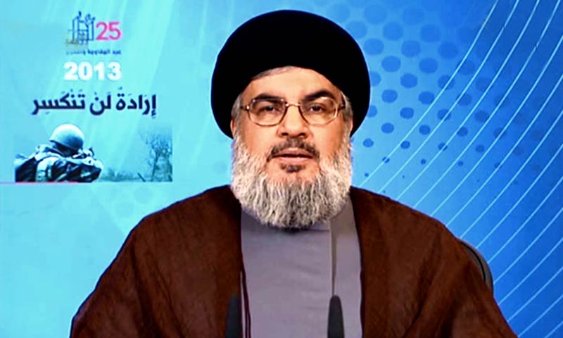 In this photo released by the Syrian official news agency SANA, Hezbollah chief Hassan Nasrallah, gives a televised speech from an unknown location to mark the anniversary of Israel's May 2000 withdrawal from southern Lebanon. -AP Photo