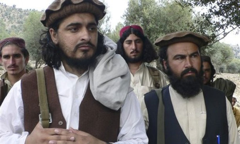 In this photo taken on October 4, 2009, new Pakistani Taliban chief Hakimullah Mehsud, left, is seen with Waliur Rehman during his meeting with media in South Waziristan’s Sararogha area. — Photo by AP/File