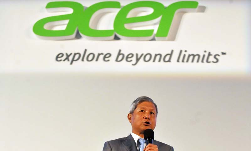 Acer Inc. Chairman and CEO J.T. Wang talks during a press conference ahead of the opening of the Computex trade fair in Taipei on June 3, 2013. — AFP Photo