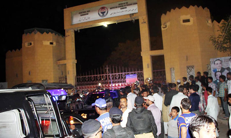 Security personnel collecting evidence from the site after a hand grenade attack outside Karachi Central Jail on Saturday night. – Photo by Online