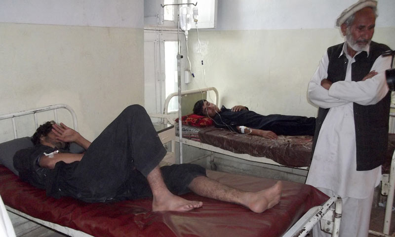 Villagers injured in a bomb blast recover at at a local hospital in Parachinar. — Photo AP