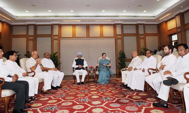 India's Prime Minister Manmohan Singh (centre L) and Sonia Gandhi (centre R), chief of India's ruling Congress Party, attend a Congress-led United Progressive Alliance (UPA) Coordination Committee Meeting with other members in New Delhi July 30, 2013. — Photo by Reuters