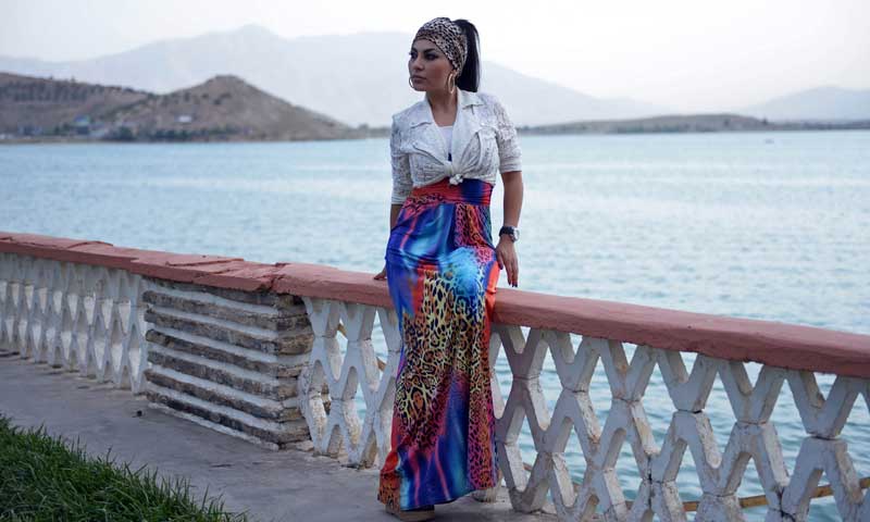 In this photograph taken on July 12, 2013, Afghan female singer Aryana Sayeed poses at Qargha lake on the outskirts of Kabul. &mdash; Photo by AFP