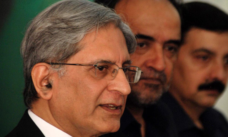 PPP leader Aitzaz Ahsan addressing a press conference along with former federal minister Qamaz Zaman Kaira at People's Secretariat. — Online photo/File