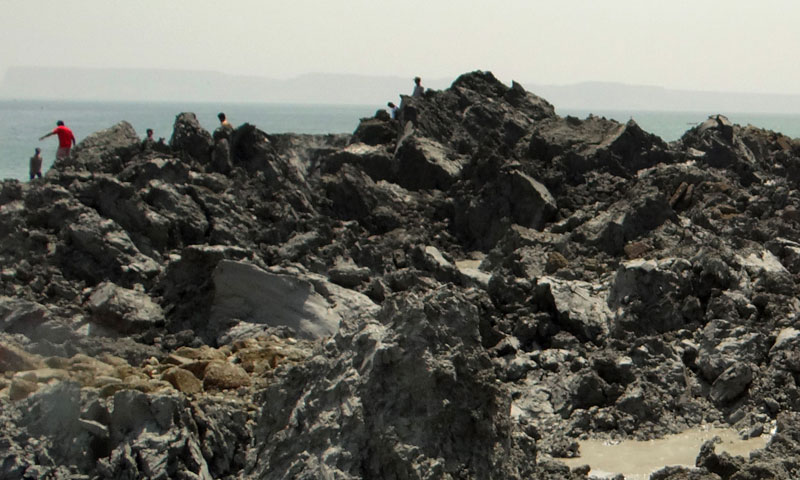 The National Institute of Oceanography has sent a team to survey the island, which stands about 20 metres (70 feet) high. —AFP PHOTO/ Pakistan Government