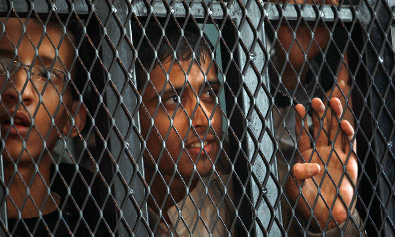 A Yemeni listens to the court's verdict - Photo by AFP