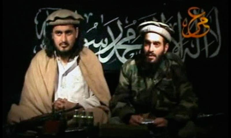 Taliban leader Hakimullah Mehsud (L) sits beside a man who is believed to be Humam Khalil Abu-Mulal Al-Balawi, the suicide bomber who killed CIA agents in Afghanistan. — Reuters Photo