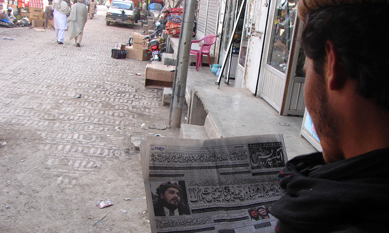 A Pakistani tribesman reads news of the killing of Taliban leader Hakimullah at a market in Miranshah, the main town in North Waziristan district on November 2, 2013. The Pakistani Taliban's ruling council met on November 2, to choose a new leader after a US drone strike killed Hakimullah Mehsud, as the government said it was determined to press ahead with peace talks. Mehsud, who was under a $5 million US government bounty, was buried late November 1 after being killed when a drone targeted his car in a compound i