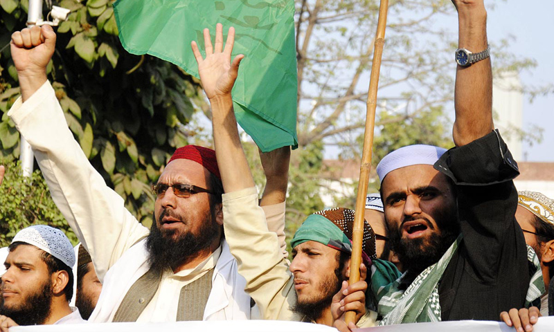 Activists of different religious parties hold a demonstration outside the Lahore Press Club.—Online Photo