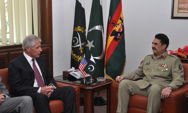 In this handout photograph released by Pakistan's Inter Services Public Relations (ISPR) on December 9, 2013 Pakistan's army chief General Raheel Sharif (R) meets with US defence secretary Chuck Hagel at the General Headquarters in Rawalpindi. — Photo by AFP