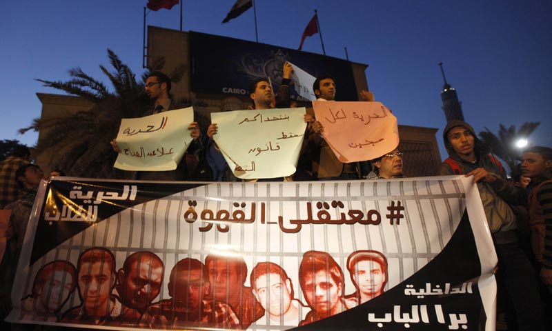 Protesters demand the release of political prisoners, outside the Cairo Opera house. -Reuters Photo