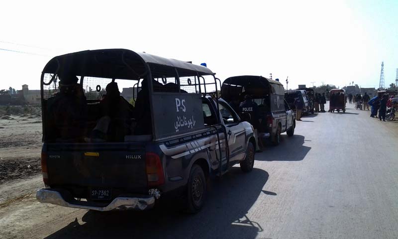 Heavy contingents of the police have been deployed in and around the graveyard under the supervision of DSP Tando Bago. — Photo courtesy of Hanif Samoon