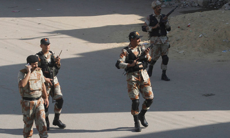 Rangers personnel patrol a street near the site of a bomb attack in Karachi January 29, 2014.—Reuters Photo