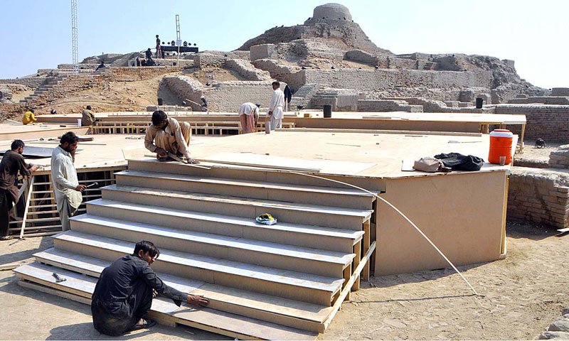 Preparations underway at Mohenjodaro for the formal launch of Sindh Festival 2014, which will be held from Feb 1 to Feb 15, to bring global recognition to the 130 heritage sites in Pakistan, especially a few of those that are in Sindh. — Photo by APP