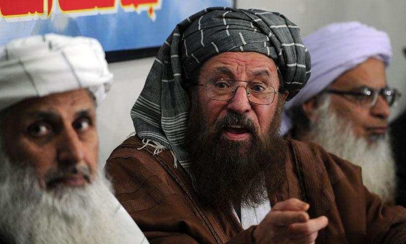 Photo from February 4, 2014 shows members of the TTP's peace talks team, Maulana Abdul Aziz (R) Maulana Sami-ul-Haq (C) and Professor Ibrahim Khan (L).—AFP Photo