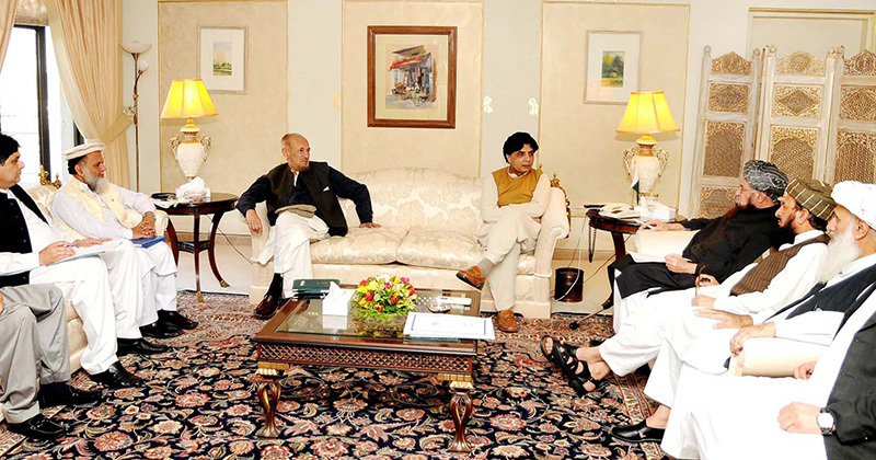 Photo shows committees representing the government and the Taliban meeting in Islamabad with Interior Minister Chaudhry Nisar Ali Khan.—Offical handout photo