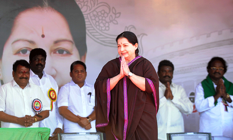 All India Anna Dravida Munnetra Kazhagam (AIADMK) Leader and Chief Minister of the southern Indian state of Tamil Nadu J. Jayalalithaa gestures as she arrives at a public meeting in Pondicherry. — Photo by AFP