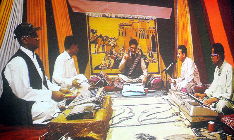 A scene from a documentary titled Blind musicians of Lyari screened by Karachi Youth Initiative at a hotel on Wednesday. — Photo by White Star