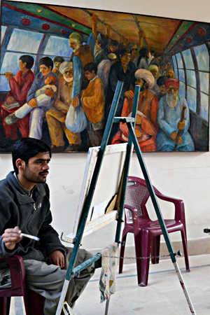  An artist paints at the Shal Art Gallery in Quetta.