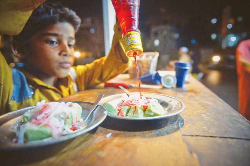 The art of serving. Photos by Fahim Siddiqi / White Star