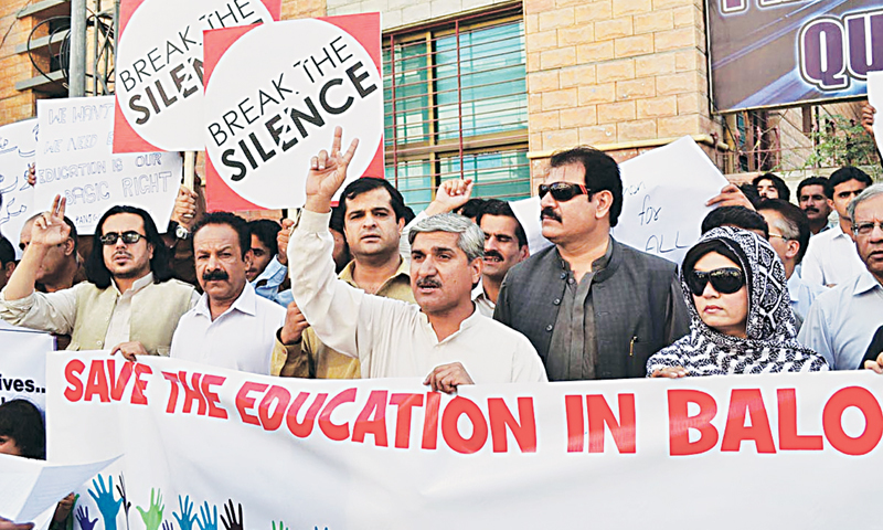 QUETTA: Activists of the Human Rights Commission of Pakistan demonstrating outside the press club here on Monday against closure of schools in Panjgur. — Online