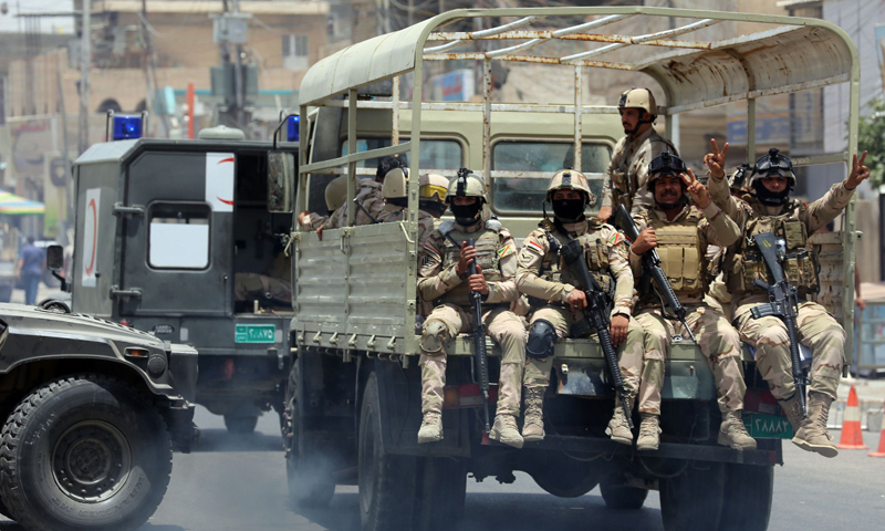 Iraqi special forces deploy as they secure a district in West Baghdad on June 18, 2014. — Photo by AFP