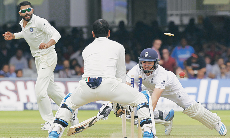 LONDON: India&rsquo;s Ravindra Jadeja (L) runs out England&rsquo;s James Anderson to give India victory in the second Test on Monday.&mdash;AFP