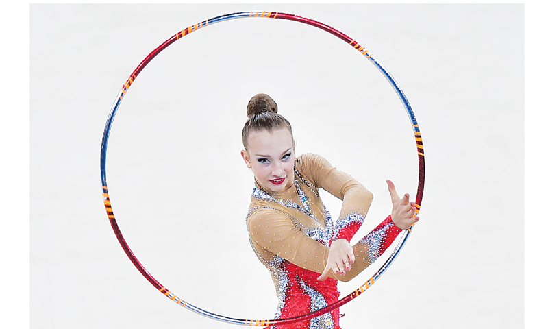 Canada’s Patricia Bezzoubenko competes in the hoop discipline 
during the Individual All-Around final 
of the Rhythmic Gymnastics event.
—AFP